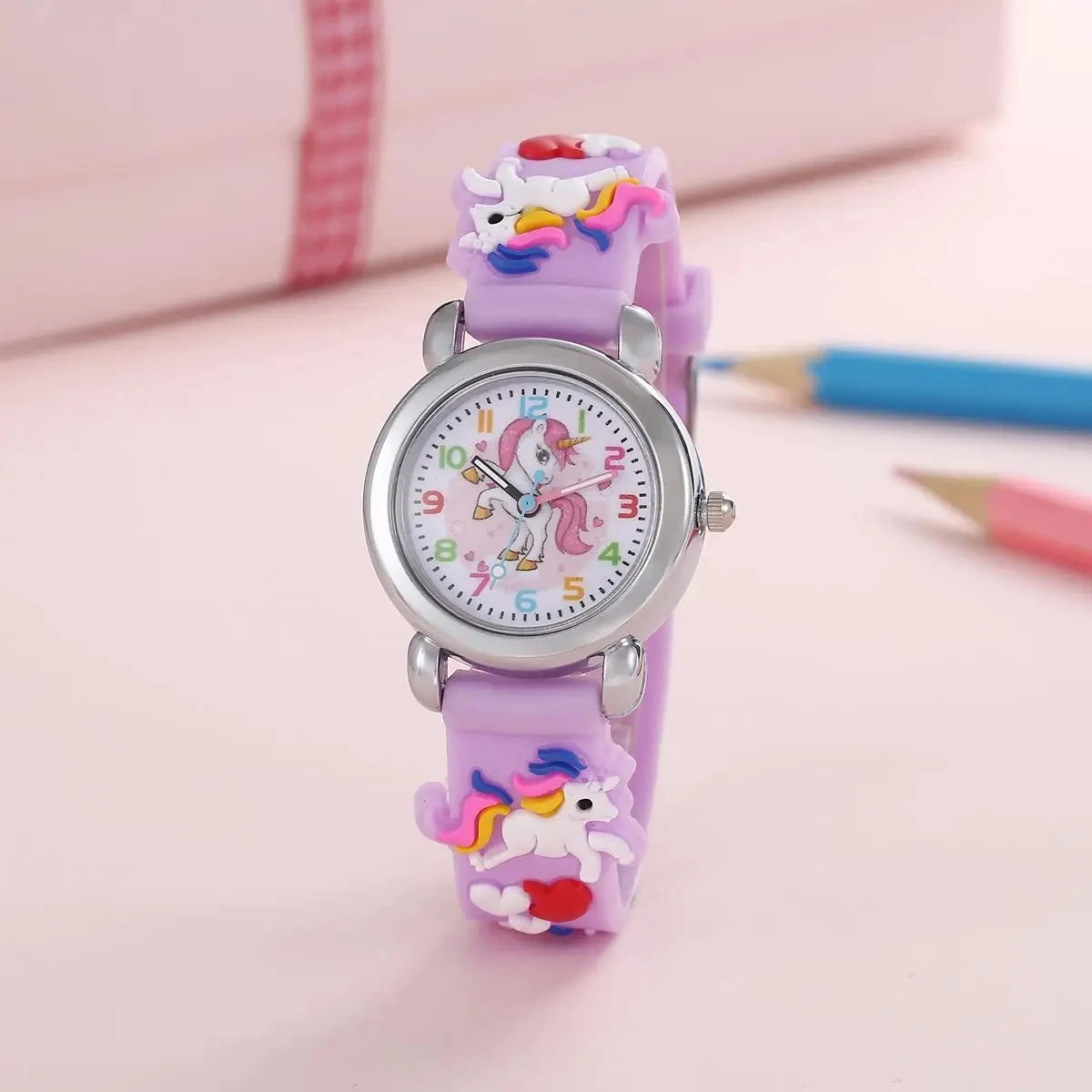 unicorn kids watch in purple on a desk